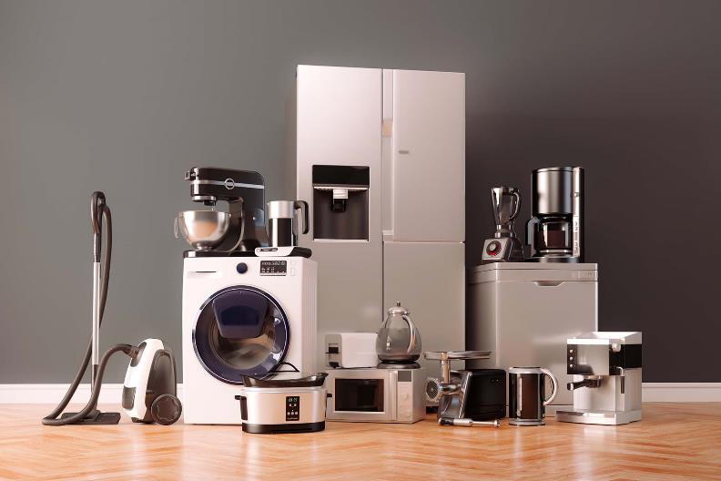 モダンな家電製品のセット(冷蔵庫、洗濯機、掃除機、調理家電など)の写真